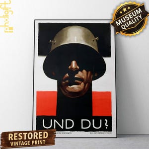 May include: A vintage propaganda poster print featuring a stylized illustration of a soldier wearing a metal helmet. The face is cast in deep shadow against a black and white background with a bold red horizontal stripe and the text UND DU?