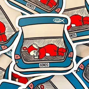 May include: A red cartoon character with a white face and a red antenna is tied up and placed in the trunk of a blue car. The car has a license plate that reads "60N20" and a fish symbol with the word "JESUS" above the trunk.