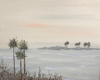 May include: A painting of a seascape with a group of palm trees on a small island in the distance. The sky is a pale pink and the water is a light blue.