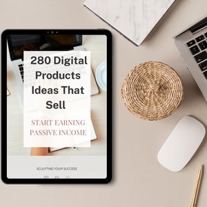 May include: A tablet screen displaying a digital product guide with the text "280 Digital Products Ideas That Sell" and "Start Earning Passive Income". The tablet is on a wooden surface with a laptop, a white mouse, a woven coaster, and a gold pen.