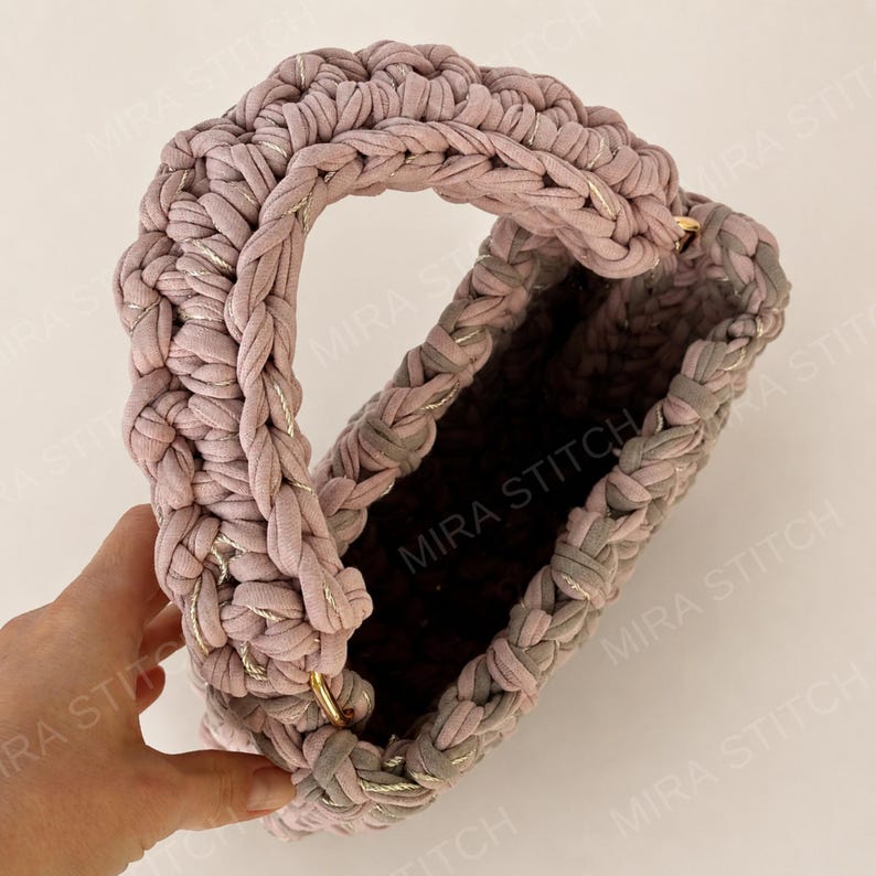 Close-up of Muse crochet bag handle and opening, showing thick T-shirt yarn texture and structured handbag construction