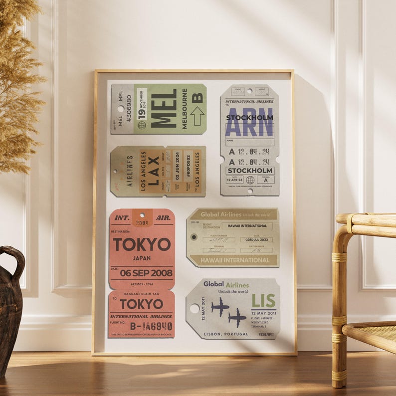 a scandinavian style home with a wood framed poster with personalised airport tags on it