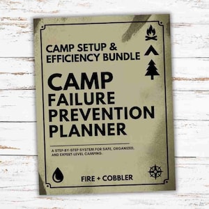 May include: A beige camping planner titled "Camp Failure Prevention Planner" with the text "Camp Setup & Efficiency Bundle." The planner includes icons of a campfire, a tent, and a tree. The bottom of the planner reads "Fire + Cobbler."