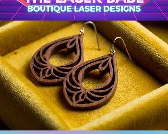 May include: A pair of delicate wooden earrings in the shape of teardrops with intricate cutouts. The earrings are displayed in a yellow velvet box. The text "DELICATE DROPS" is visible at the bottom of the image.