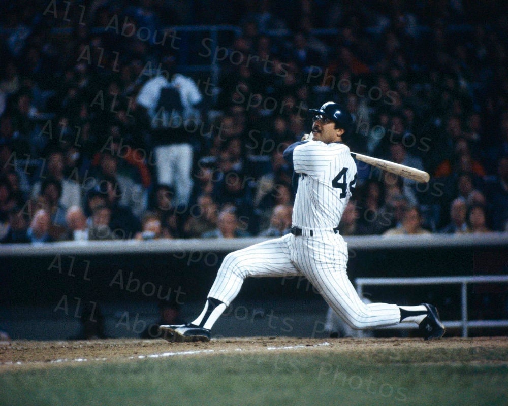 Reggie Jackson hitting one of his 3 Home Runs in the 1977 World Series Game 6