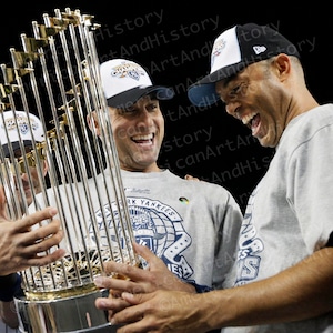 Derek Jeter and Mariano Rivera celebrate another World Series Win