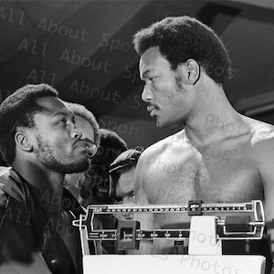 George Foreman and Joe Frazier at their Weigh In before their first Shocking Battle in 1973