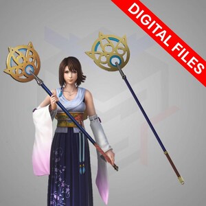 May include: A digital image featuring a character holding a staff with a gold and blue circular design. The staff has a long blue pole with a brown handle. The image has the text "DIGITAL FILES" in red.