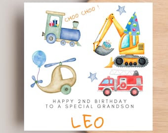 May include: A white card with a watercolor illustration of a train, excavator, helicopter, and fire truck. The card says "Happy 2nd Birthday to a special grandson Leo" in orange text.