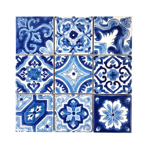 May include: A set of nine blue and white ceramic tiles with intricate floral patterns. The tiles are arranged in a 3x3 grid.