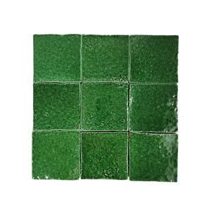 May include: Nine square green ceramic tiles arranged in a 3x3 grid.