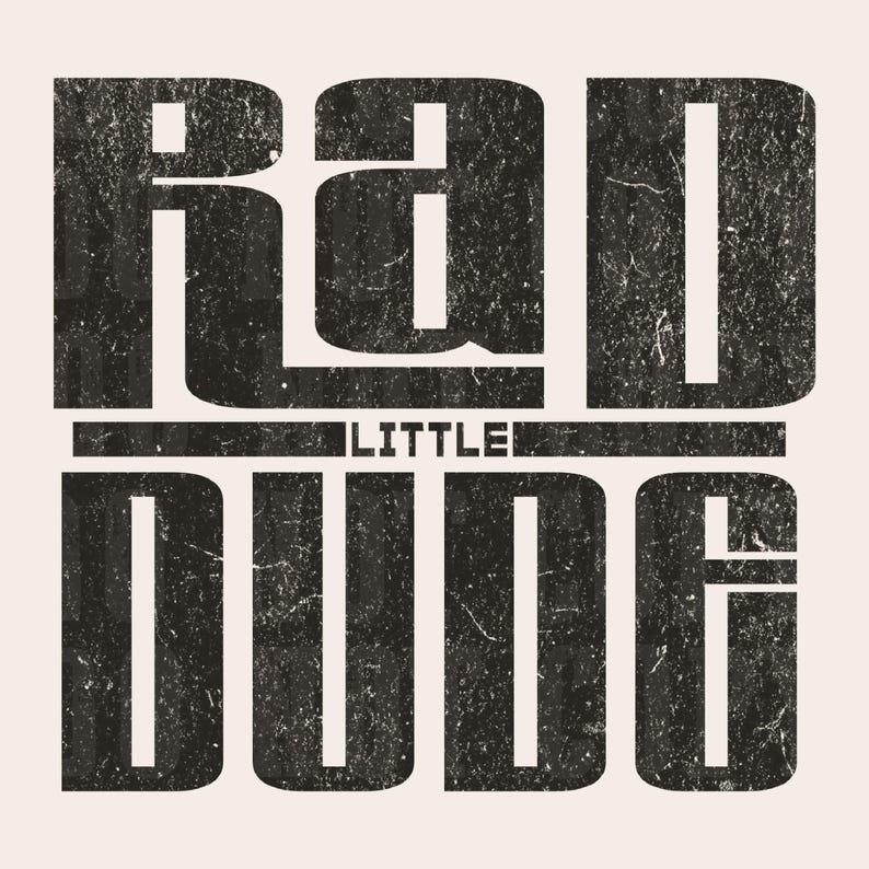 May include: Black and white graphic design with the text "Little Rad Dude" in a distressed font.