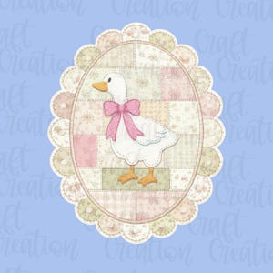 May include: A white goose illustration with a pink bow, standing on a patchwork oval. The patchwork features floral and geometric patterns in pastel colors. The oval is framed by a scalloped border, all set against a light blue background.