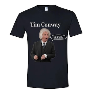 May include: A navy blue t-shirt featuring a graphic of Tim Conway in character, with the text "Tim Conway" above and a speech bubble that says "KA...WALLA". The image is a humorous design.