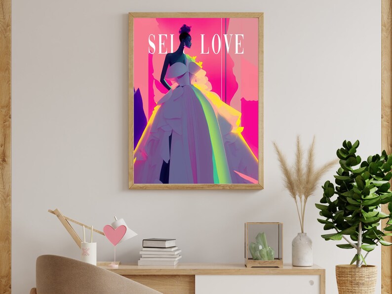 May include: A framed print of a woman in a white dress with a pink, purple, and green background. The text "SELF LOVE" is printed in white on the top of the image.