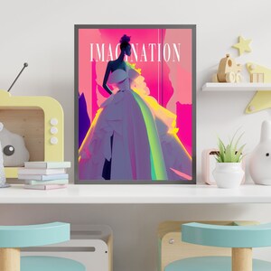 May include: A framed poster with a colorful illustration of a person wearing a white dress with a rainbow gradient. The poster has the word "IMAGINATION" printed in black letters.