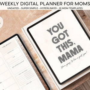 May include: A digital planner for moms with a motivational quote: "You got this, mama! You're going to have a great year!" The planner is on a wooden surface with a brown background.