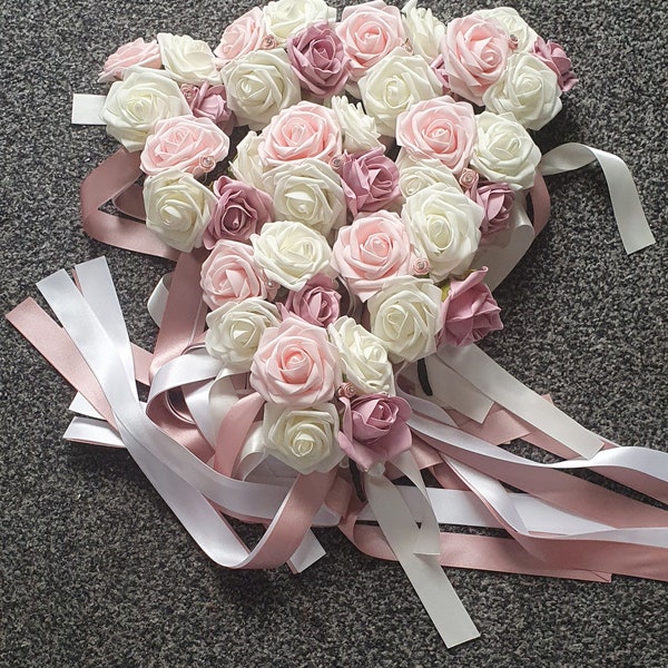 Handmade wedding aisle flowers