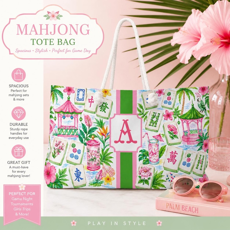 May include: A white tote bag with a Mahjong-themed print, featuring pink and green accents, Mahjong tiles, and a large pink letter "A". The bag has white rope handles and the text "MAHJONG TOTE BAG".
