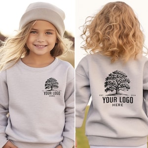 May include: A gray sweatshirt with a tree and the text "EST. 2014 YOUR LOGO HERE" on the back. The front of the sweatshirt has a smaller version of the tree and the text "EST. 2014 YOUR LOGO HERE" on the front.