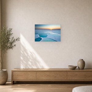 Frozen Salt Flats at Sunset - Canvas Wall Art shown as canvas wall art in a oak console living room mockup