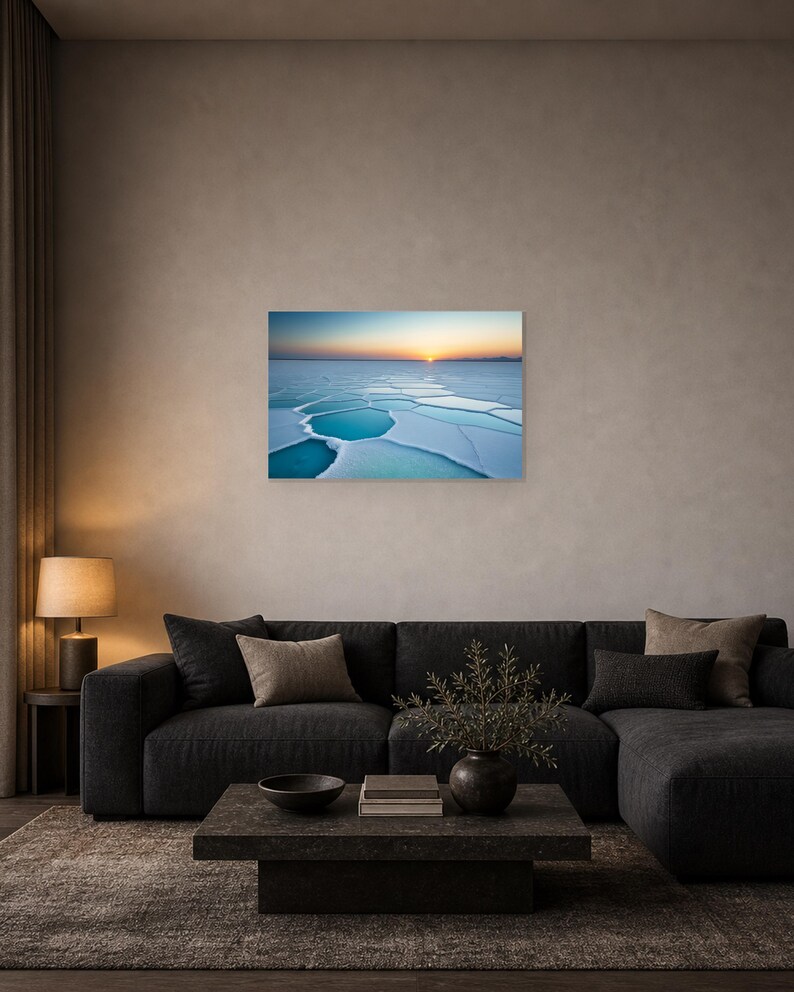 Frozen Salt Flats at Sunset - Canvas Wall Art shown as canvas wall art in a dark sofa black frame mockup