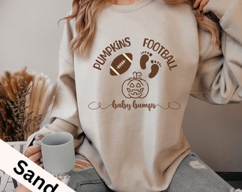 Sudadera de maternidad con anuncio de embarazo y barriguitas de fútbol