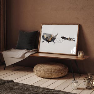 a picture frame sitting on top of a wooden table