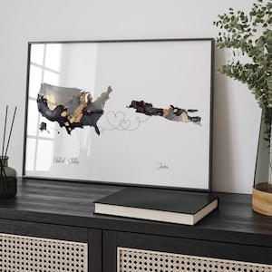 Peut inclure: Une carte en noir et blanc des États-Unis et du Japon avec un accent doré et une ligne en forme de cœur reliant les deux pays. Le texte "États-Unis" et "Japon" est sous la carte.