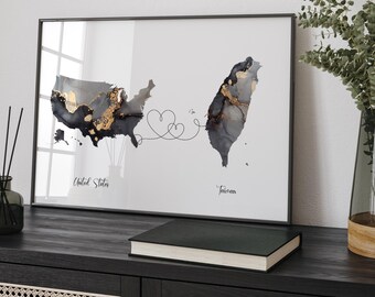 May include: A framed print of a map of the United States and Taiwan connected by a line with hearts. The map is in shades of gray with gold accents. The text "United States" and "Taiwan" is printed below the maps.