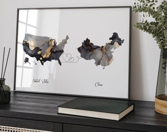 May include: A black and white map print with gold accents showing the United States and China connected by a line with hearts. The text "United States" and "China" is below each country.