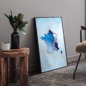 Impresión de arte mural con el mapa de Francia en tonos azules y plateados