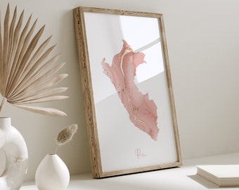 May include: A framed print of a pink and gold watercolor map of Peru. The map is surrounded by a light wood frame.