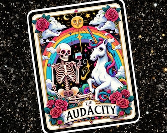 May include: A tarot card with a black and white skeleton and a white unicorn with a rainbow mane and tail. The card is set against a black background with a rainbow, clouds, and stars. The card reads "The Audacity".