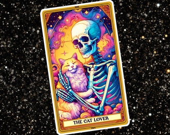 May include: A tarot card with a colorful illustration of a skeleton holding a cat. The card is titled "The Cat Lover".