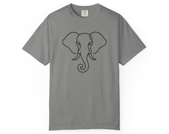 May include: Gray t-shirt featuring a black line drawing of an elephant's head. The elephant design includes large ears, a trunk, and a simple outline. The shirt is made of a soft material and has a crew neck.