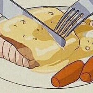 May include: A white plate with a fork and knife cutting into a piece of meat covered in a creamy sauce. There are two orange carrot slices on the plate.