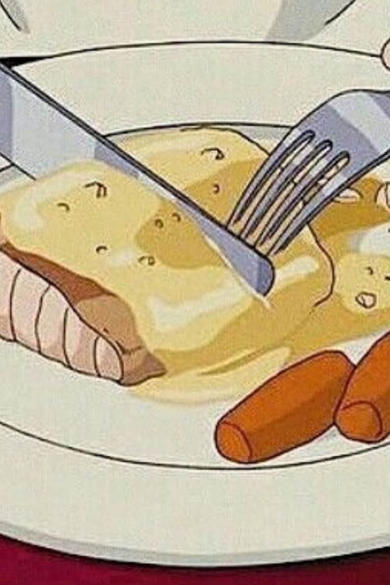 May include: A white plate with a fork and knife cutting into a piece of meat covered in a creamy sauce. There are two orange carrot slices on the plate.