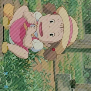 May include: A young girl with brown hair and a pink and white dress sits on a wooden surface. She is wearing a straw hat with a pink ribbon. The girl is looking to the side with a surprised expression. The background is a green garden with plants and flowers.