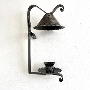 Norwegian folk art, wall mounted candle holder in wrought iron, vintage.