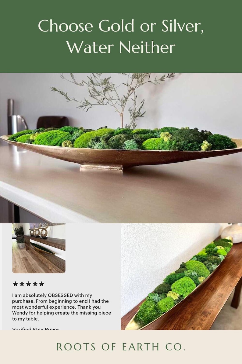 May include: A long, shallow, metallic gold-toned boat-shaped bowl filled with various shades of green preserved moss and a small sprig. The text "Choose Gold or Silver, Water Neither" and "ROOTS OF EARTH CO." appear on the image with a review.