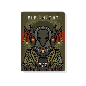 May include: A green and brown card with the text "ELF KNIGHT" in white. The card features a cartoon illustration of a creature with a green and brown mask, wearing a necklace of bells and a cloak of feathers. The card also has the text "2/2" in white.