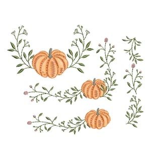 May include: Embroidered design featuring three orange pumpkins with green leafy vines and small pink flowers. The pumpkins are arranged in a row with the vines and flowers forming a border around them.