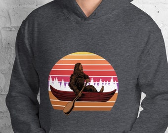 Sudadera con capucha unisex, Bigfoot en una sudadera con capucha de canoa