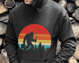 Sudadera con capucha unisex, Bigfoot llevando una sudadera con capucha de caña de pescar