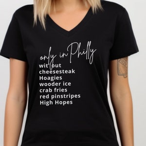 ONLY in Philly V-Neck T-Shirt - Short Sleeve Celebrating Philly Staples like Cheesesteaks, Hoagies, Wooder Ice, & Crab Fries Phillies Fans