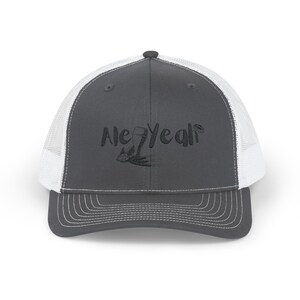 May include: A gray and white trucker hat with a black embroidered design that says "Ale Yeah!" with a beer glass graphic.