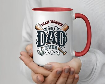 May include: White ceramic mug with a red interior and handle. The mug features the text "Team Worden Best Dad Ever" in a baseball-themed design with bats and a baseball.