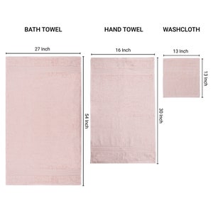 May include: Three pink towels of different sizes: a bath towel measuring 27 inches by 54 inches, a hand towel measuring 16 inches by 30 inches, and a washcloth measuring 13 inches by 13 inches.