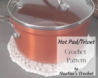 May include: A white crocheted hot pad or trivet with a copper pot on top. The text "Hot Pad/Trivet Crochet Pattern by NaeNae's Crochet" is visible in the image.
